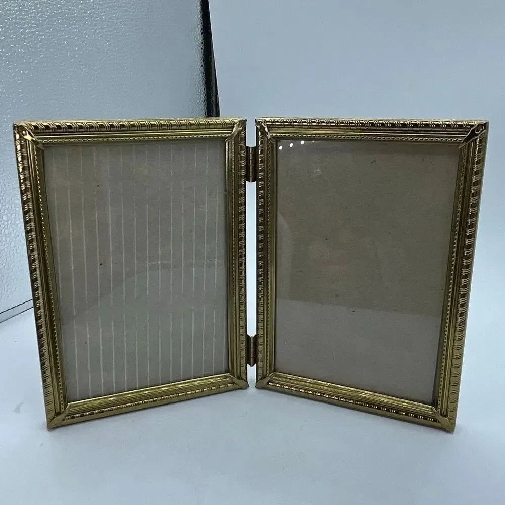 Vintage gold tone hinged double 5 X 7 frames